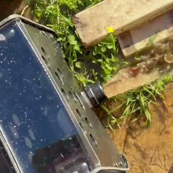 The far end of the trough where dirty water drains out